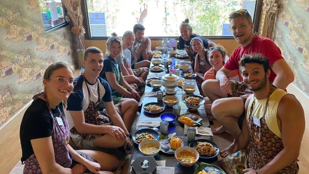 Tourists enjoying their prepared dishes at Siam Garden Cooking School in Chiang Mai