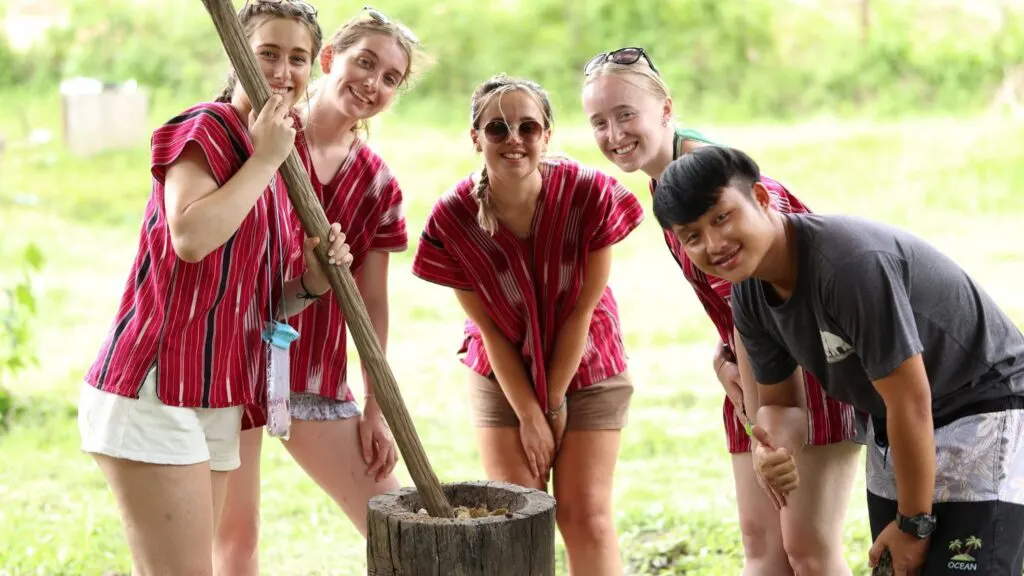 Get hands-on with food preparation during our Chiangmai elephant tour