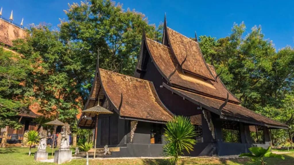 Traditional Northern Thai architecture at Baan Dam Museum, a highlight of the Chiang Mai to Chiang Rai tour - Discover art and culture in northern Thailand.