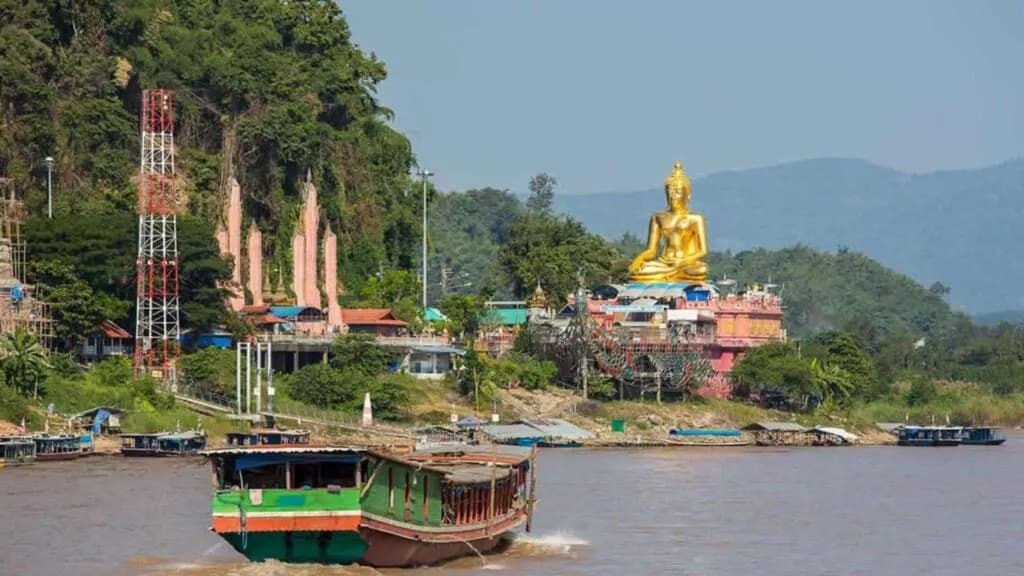 Scenic boat ride along the Mekong River at the Golden Triangle during your Chiang Rai excursion from Chiang Mai.