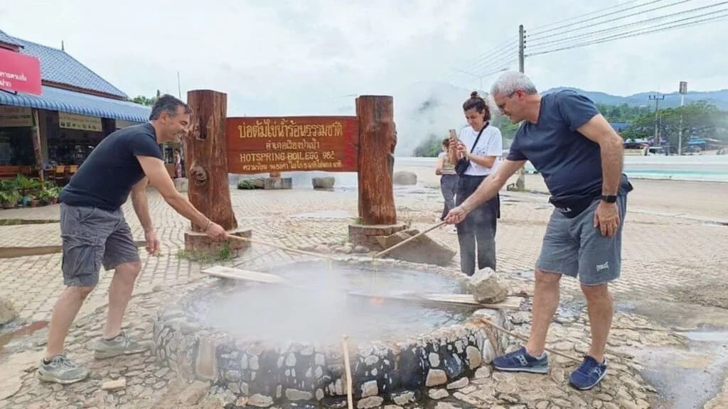 Soothing natural hot spring visit, a relaxing start to your Chiang Rai excursion from Chiang Mai, offering a rejuvenating experience.