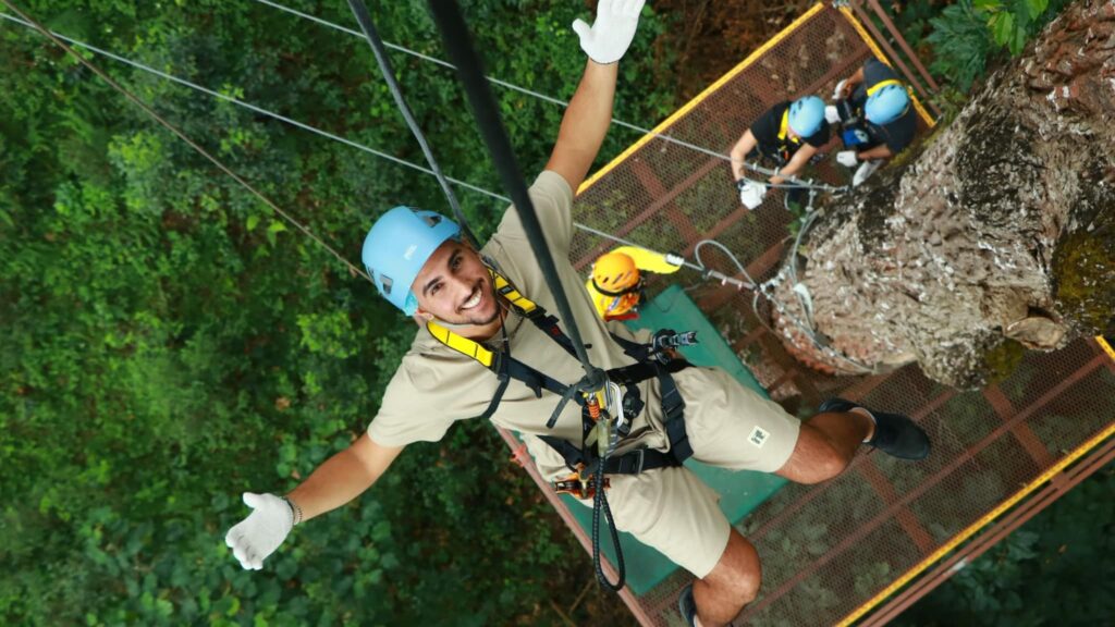 Customer enjoying a high-flying zipline ride in Chiangmai