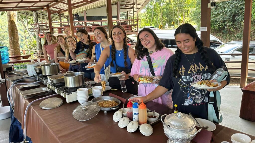 Group enjoying a delicious meal after the Chiangmai zipline tour