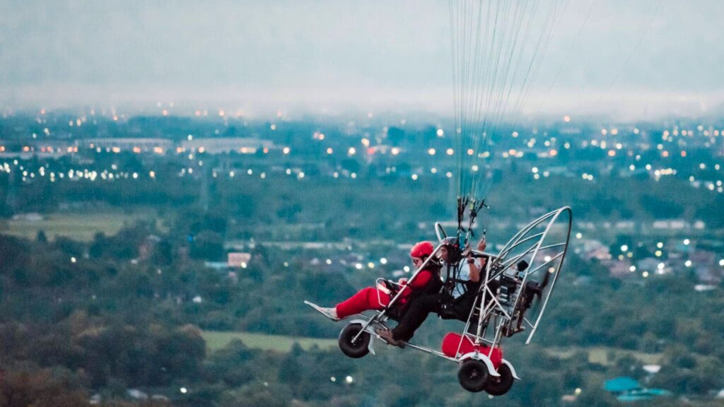 Night paramotoring adventure overlooking city lights with Chiangmai Go Tours