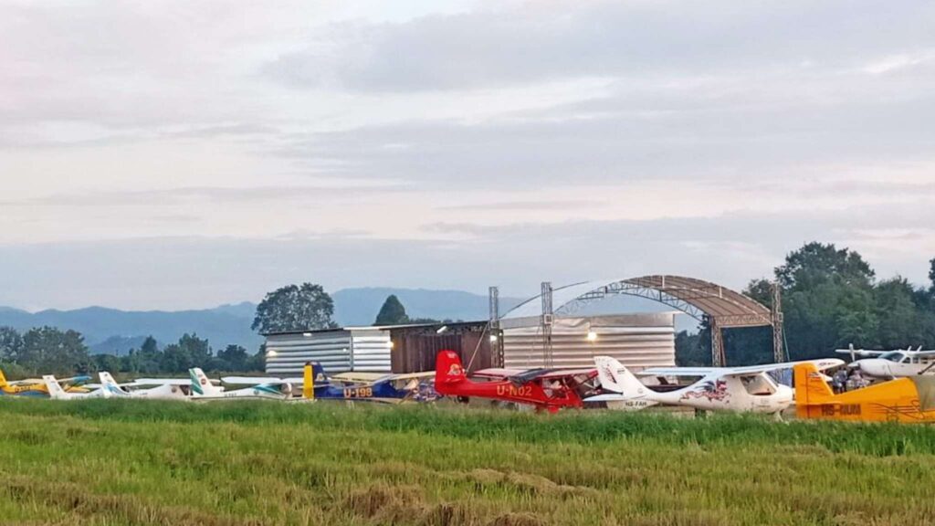 Light aircraft lineup at a Chiang Mai airfield, highlighting the variety of options for aerial tours in our Chiang Mai tour.