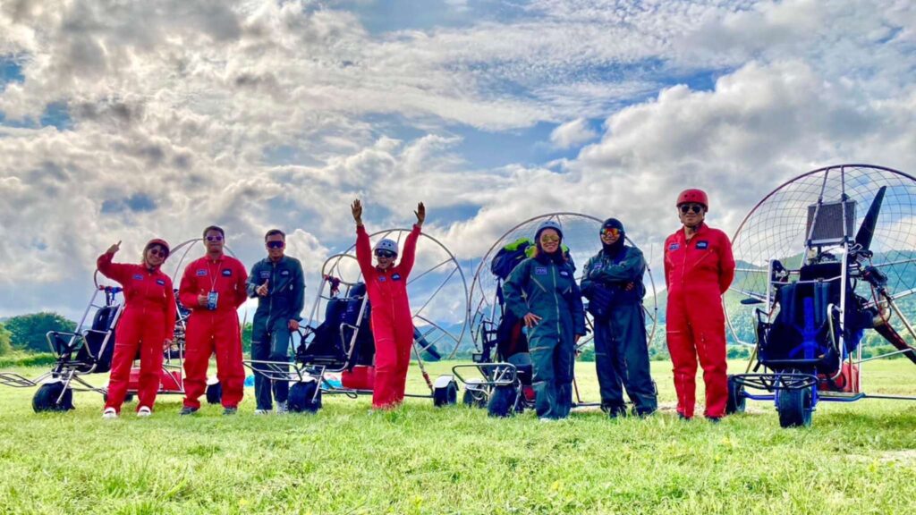Group of adventurers ready for a paramotor tour in Chiang Mai