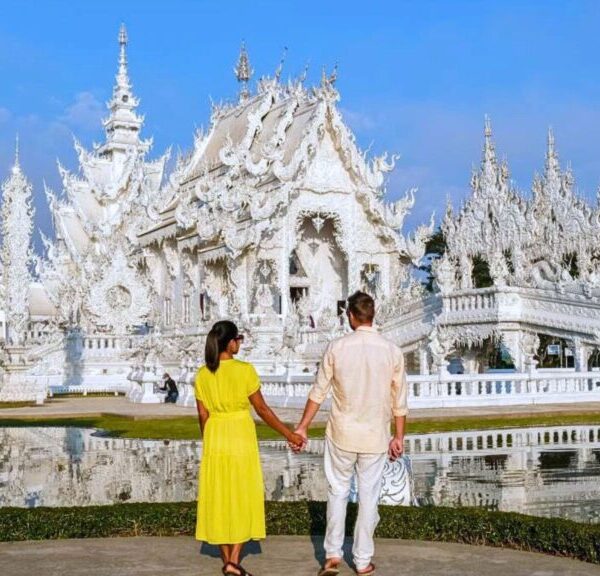 architecture of the White Temple (Wat Rong Khun) in Chiang Rai, Thailand, under a clear blue sky