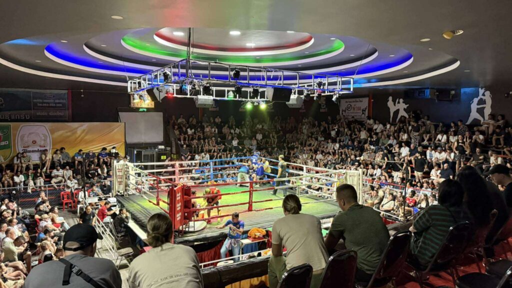 The vibrant atmosphere inside Chiang Mai Boxing Stadium – a highlight of your Chiang Mai excursion.
