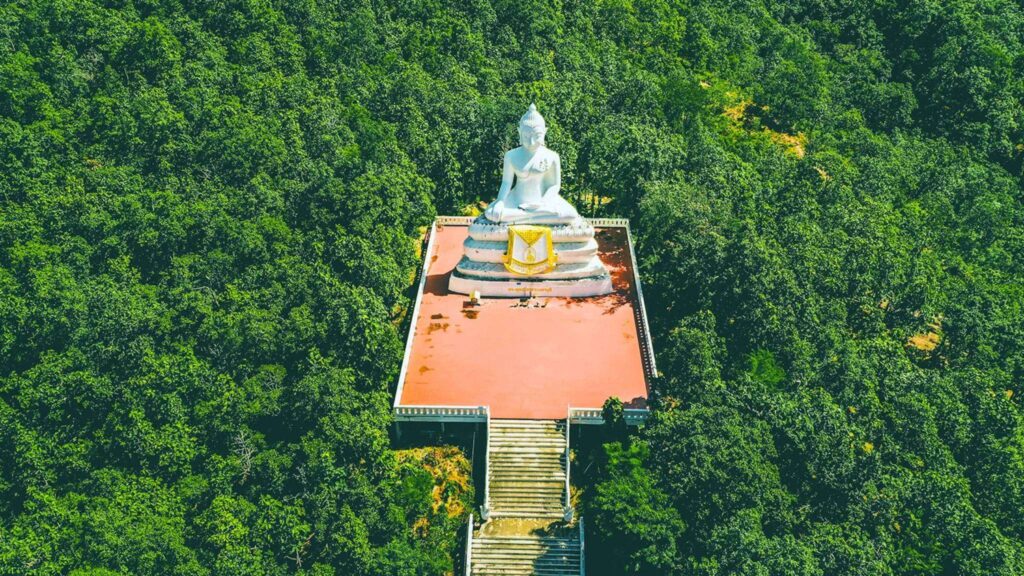 A peaceful and scenic Buddhist temple perched on a hill, with breathtaking views.