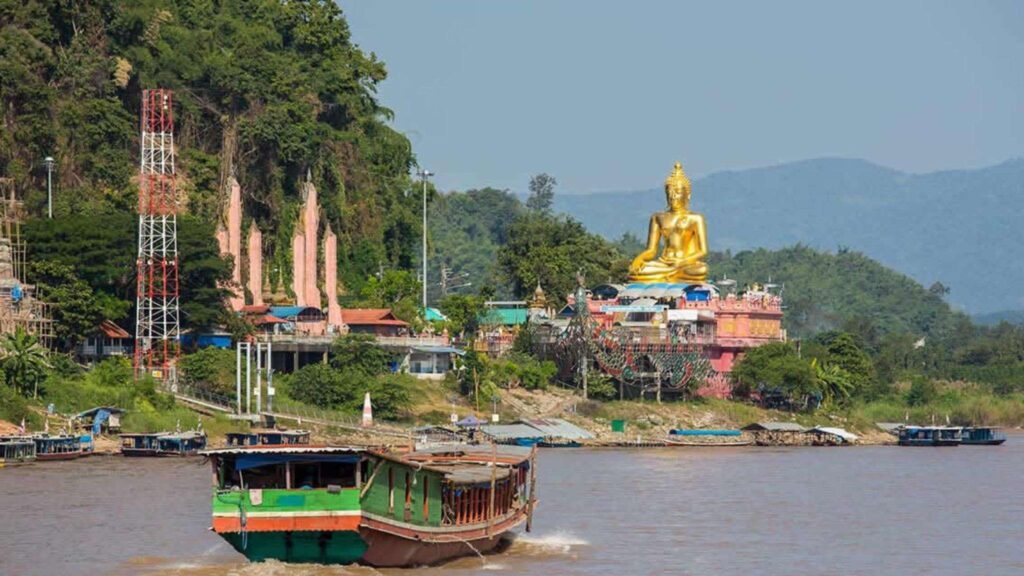 Scenic boat ride along the Mekong River at the Golden Triangle during your Chiang Rai excursion from Chiang Mai.