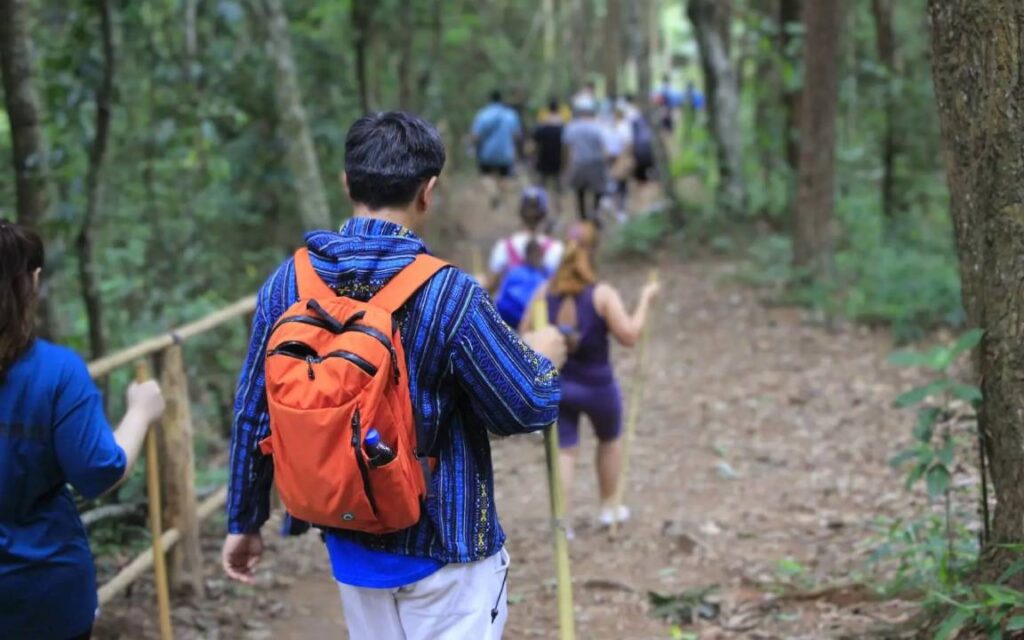 Group of visitors hiking along the Pha Dok Siew Nature Trail