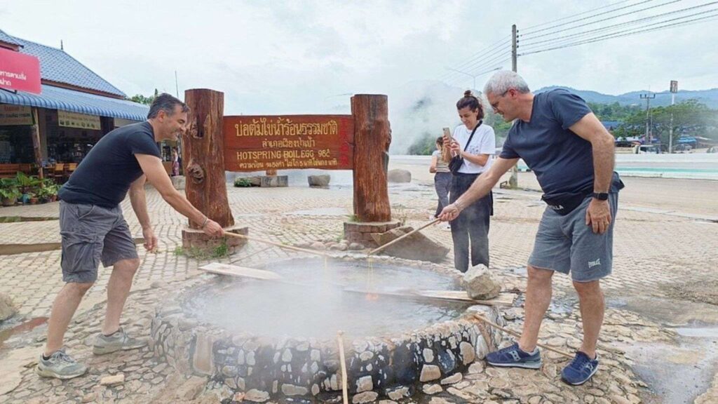 Soothing natural hot spring visit, a relaxing start to your Chiang Rai excursion from Chiang Mai, offering a rejuvenating experience.
