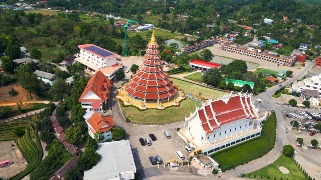 Aerial view of Wat Huay Pla Kang temple in Chiang Rai with its stunning pagoda and giant Buddha, popular in Chiangmai day tours and excursions.